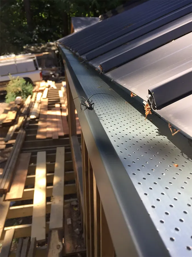Alu-Rex gutter guard on a metal roof — Gutter King, Vancouver Island